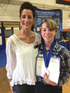 Student and teacher at ceremony