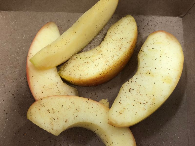 Photo of apple slices with cinnamon sugar on them