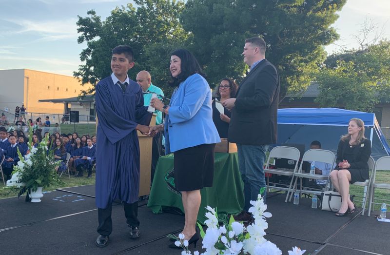 Photo of students and staff at Rivera graduation