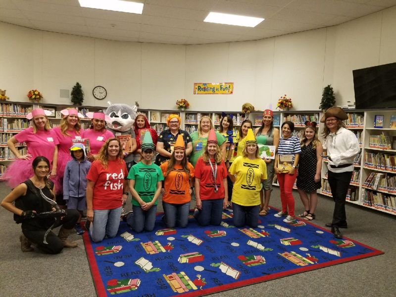 Photo of teachers dressed up for literacy day